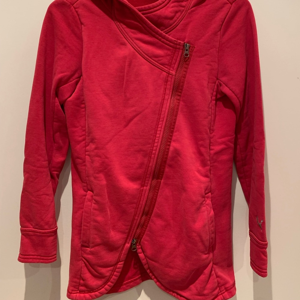 Bright pink Puma sweatshirt with asymmetrical zipper detail. Size M